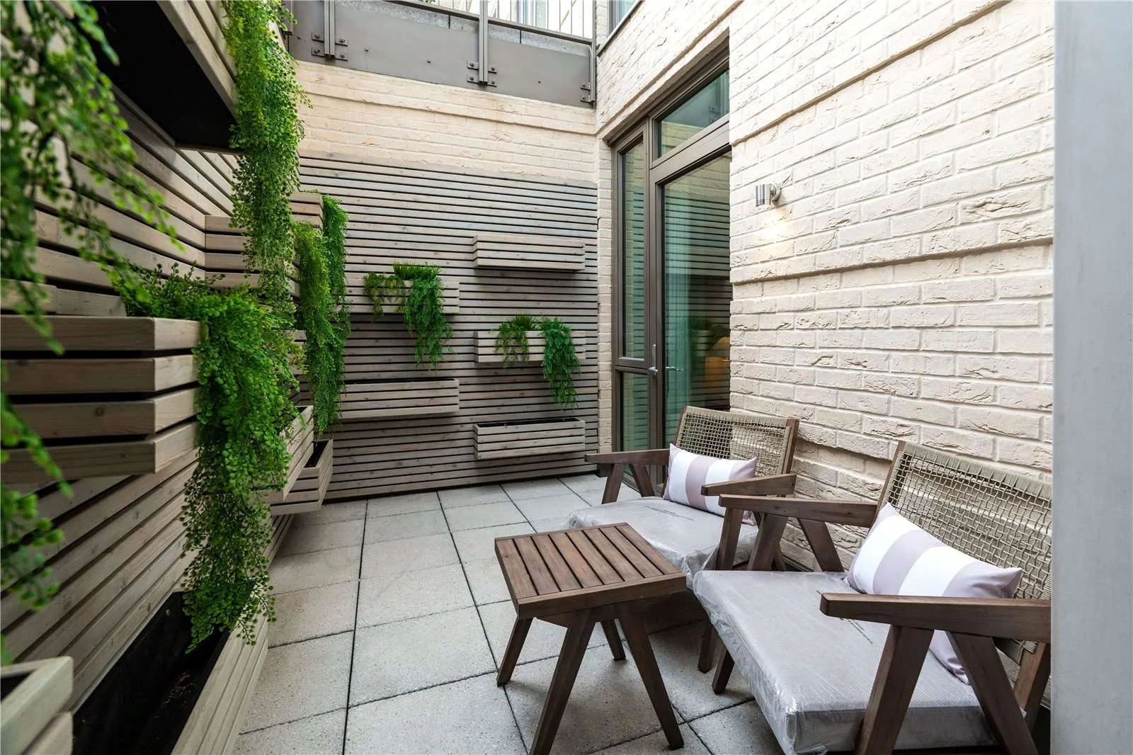 The Auria Portobello Square Ladbroke Grove London W10 Outdoor Terrace Garden Seating Area Brick Wall