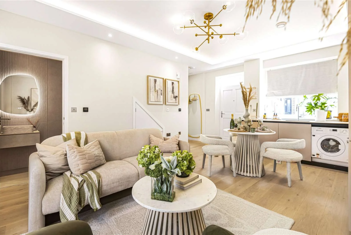 The Warwick Ealing W5 5pt London Living Room Open Plan Layout Kitchen View Wood Floor Gold Pendant Light Sofa